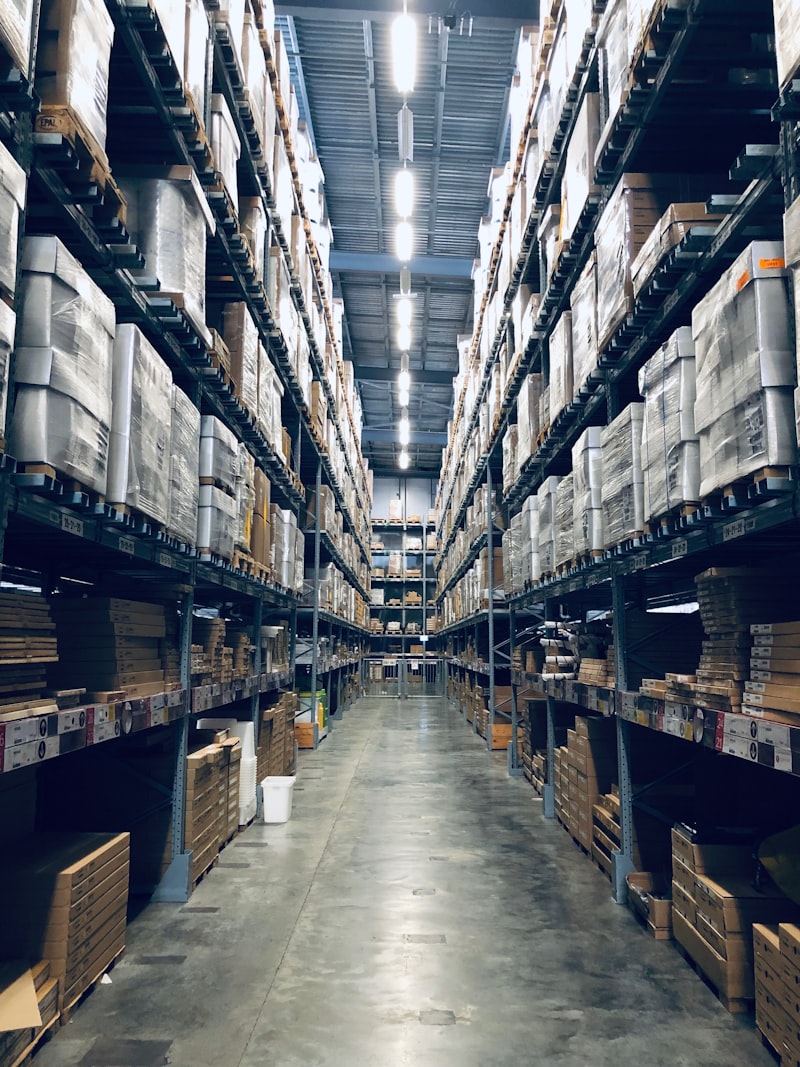 Modern warehouse with pallets and forklift